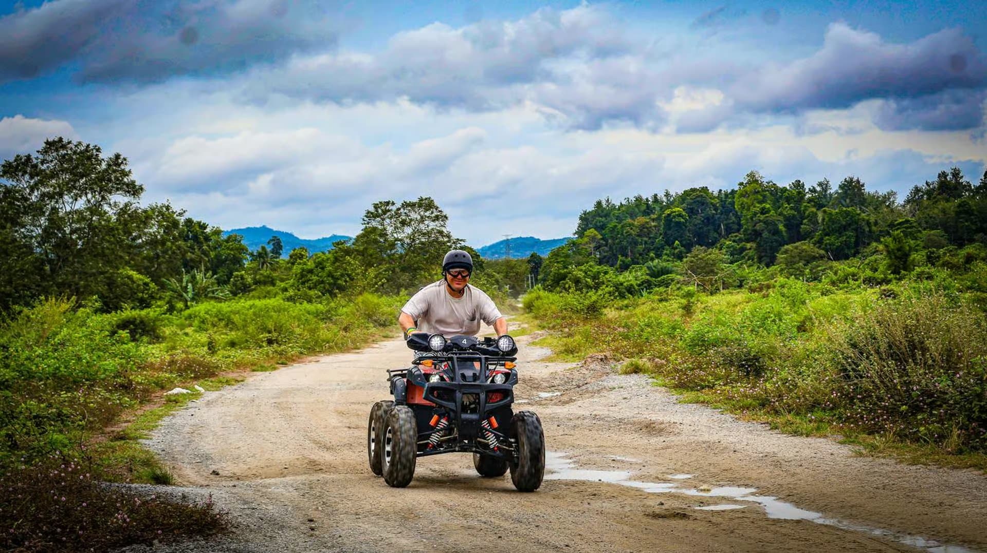 ATV trail rider through Langkawi jungle